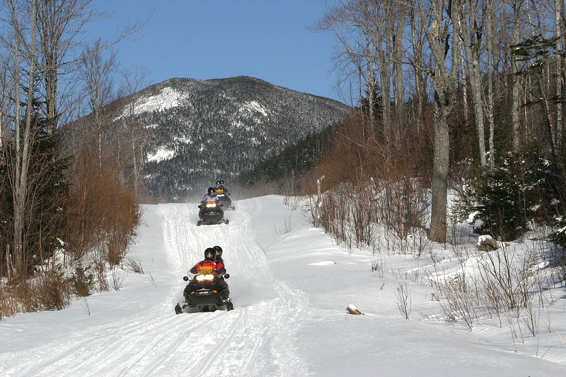 Snowmobile in The Forks Maine