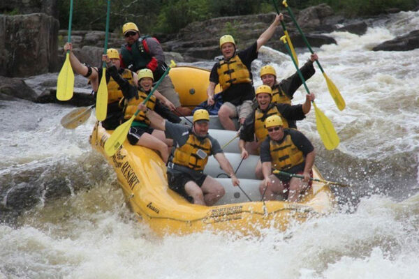Penobscot rafting smiling group hold on