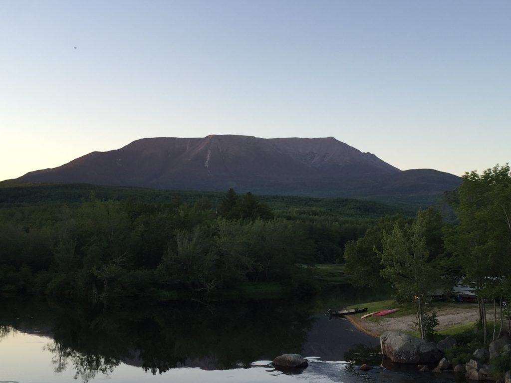 Abol Bridge Campground in front of Mount Katahdin in Maine at dusk 