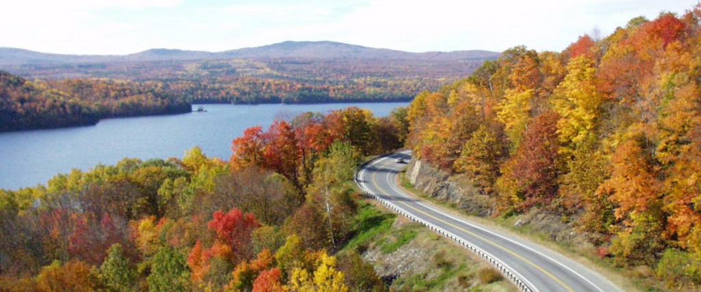 Scenic drive with fall leaves and the Kennebec River on Route 201 in The Forks, Maine