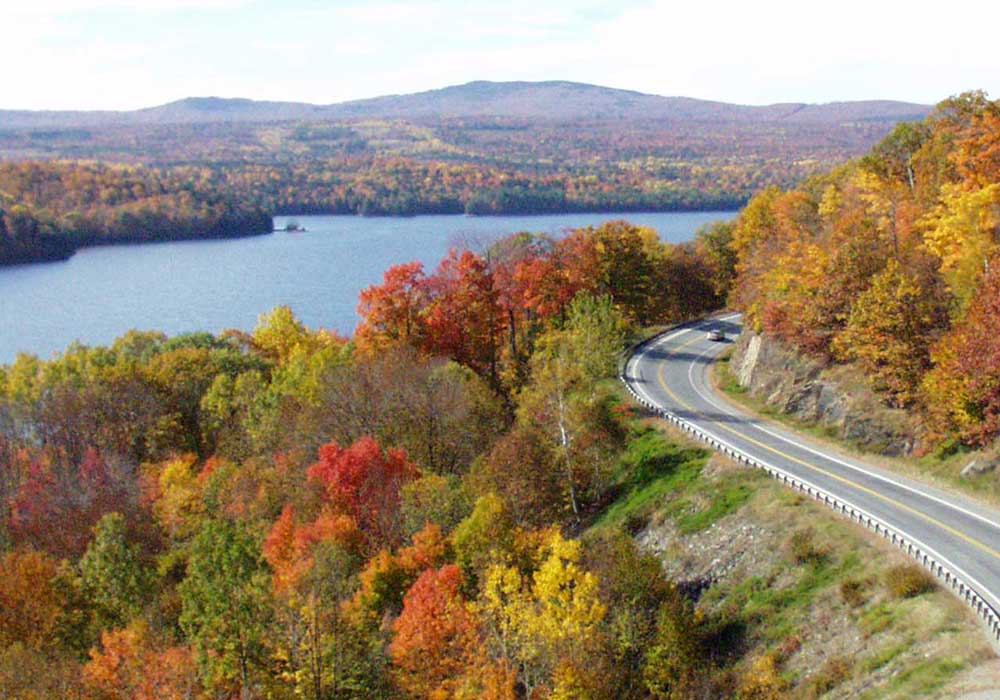 Fall foliage on scenic byway Route 201 in Maine makes the perfect destination wedding location!