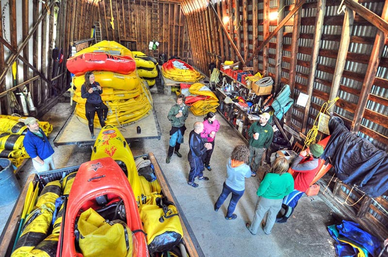 River guides in raft barn during guide training