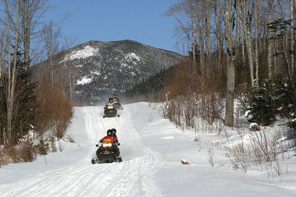 Snowmobiling in Western Maine Mountains