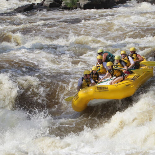 Teenagers rafting cribworks penobscot
