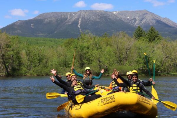 Spring rafting on the Penobscot River in wetsuits